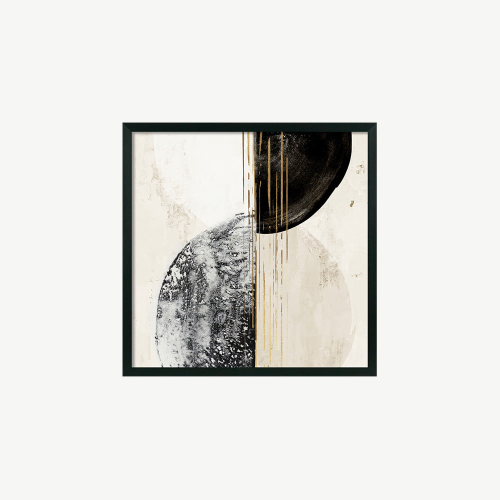 Abstract artwork of two contrasting circles cut in half by vertical gold lines placed in a simple black frame