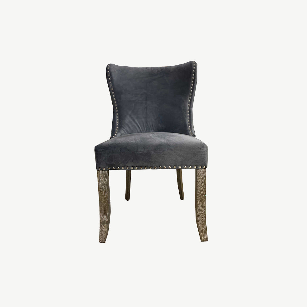 Dark grey soft velvet dining chair with shaped wooden legs