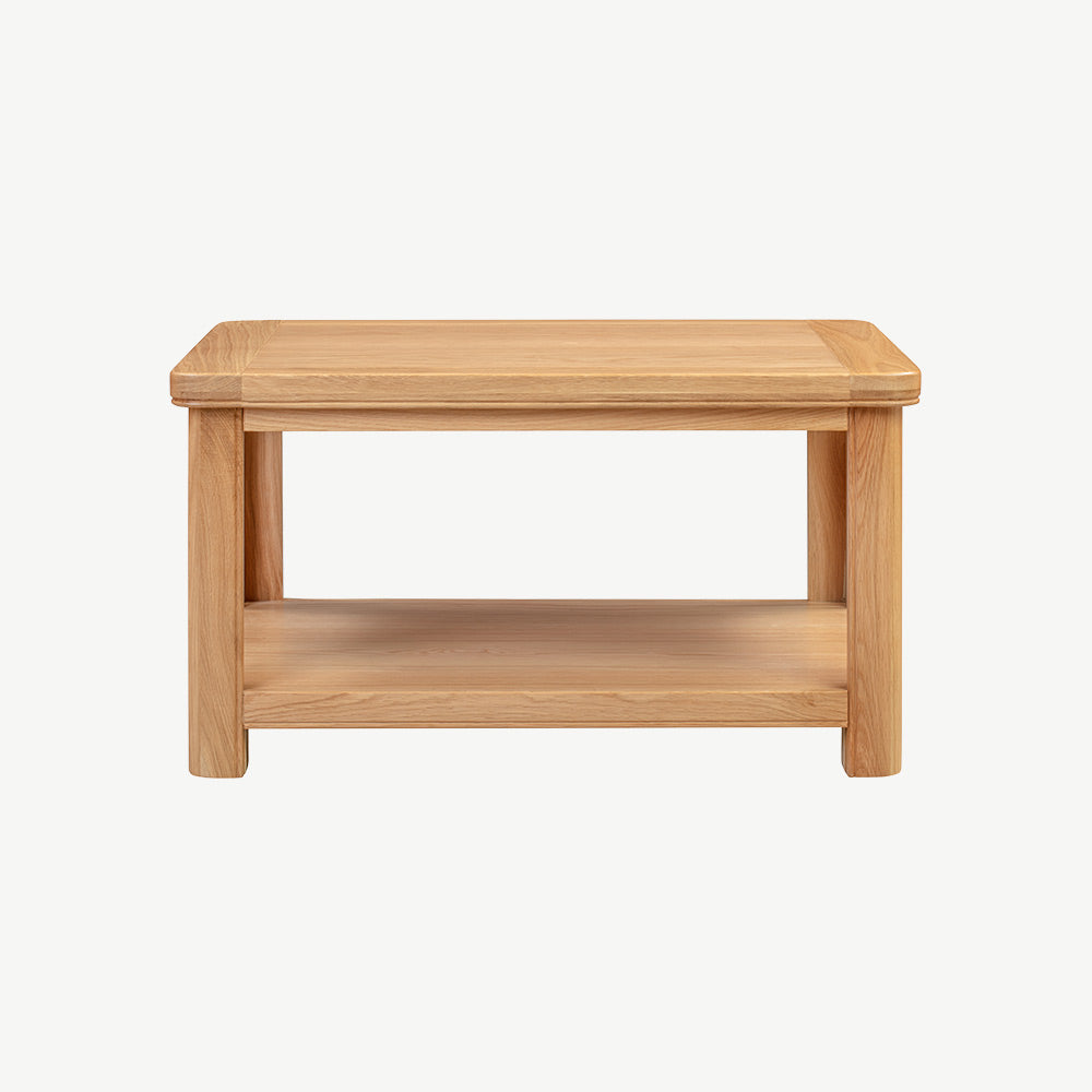 Wood coffee table with storage shelf in natural oak finish