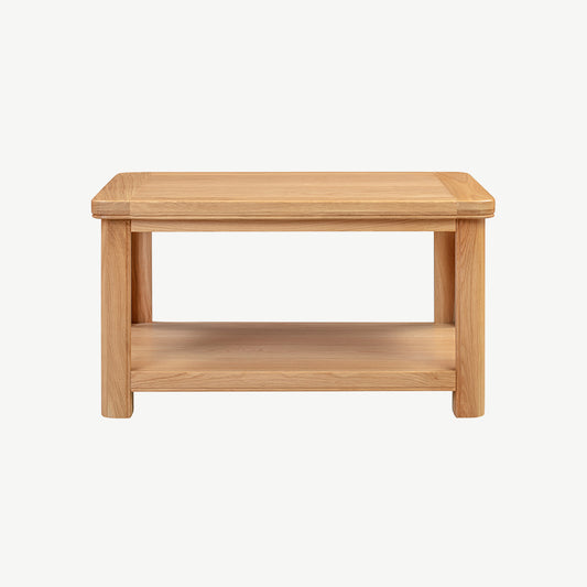 Wood coffee table with storage shelf in natural oak finish