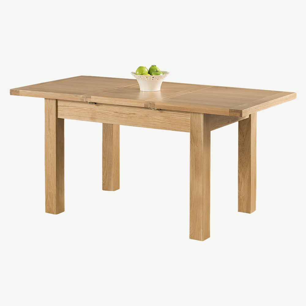 Oak extending dining table in natural finish with four leg base