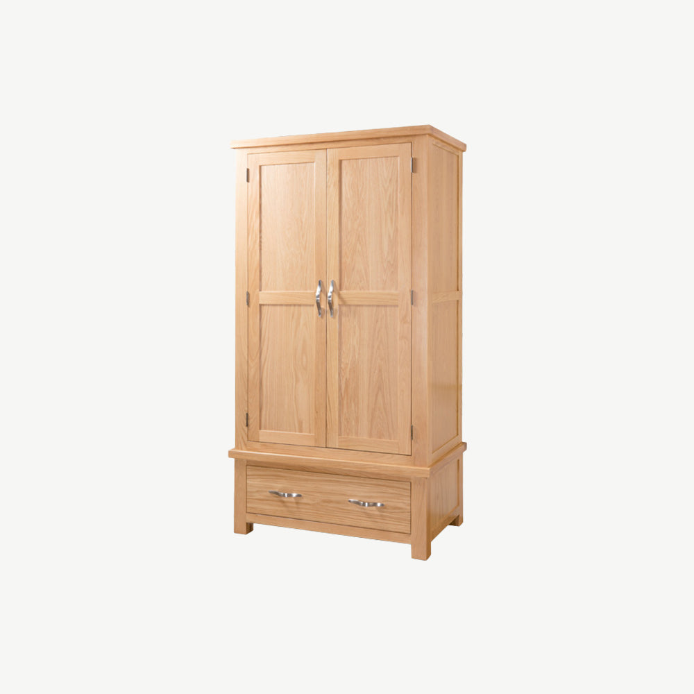 Oak double wardrobe in natural finish with bottom drawer and silver coloured handles