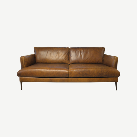 Soft brown small sofa with tapered wooden legs