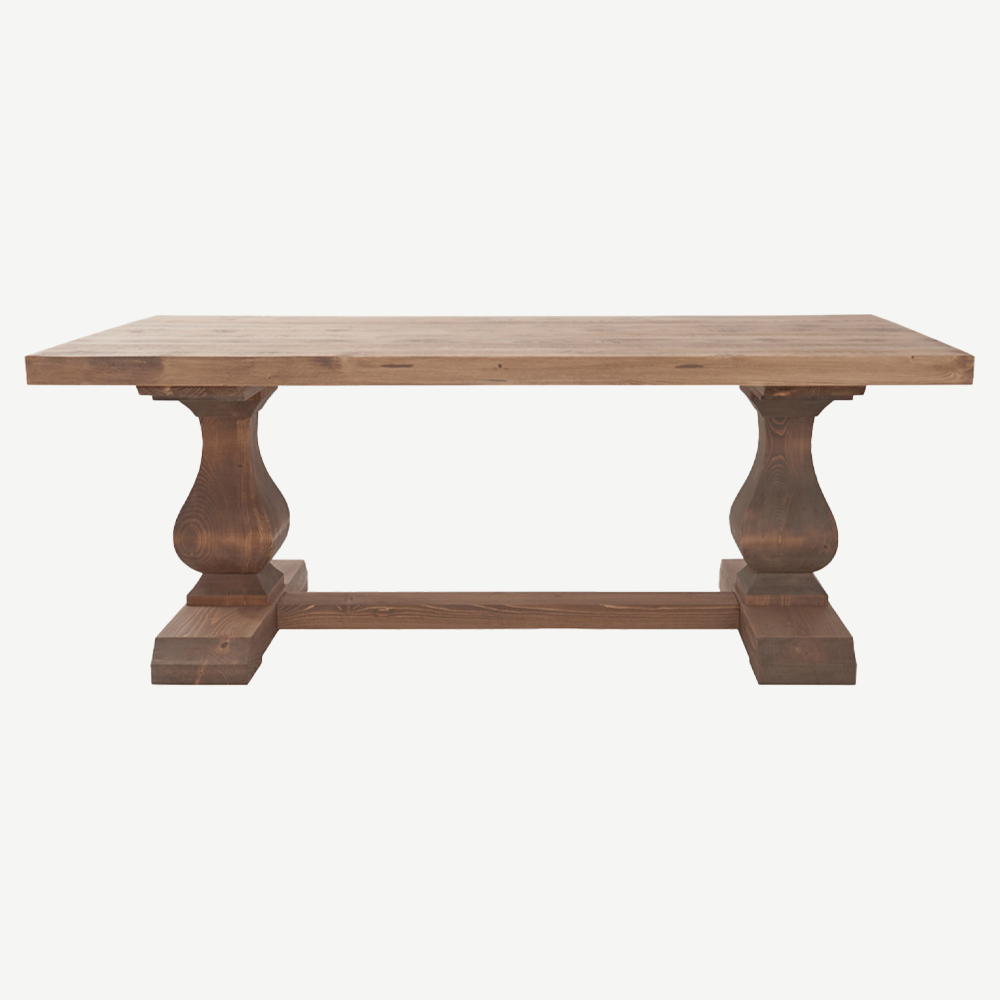 Reclaimed timber dining table in natural finish with solid legs and base
